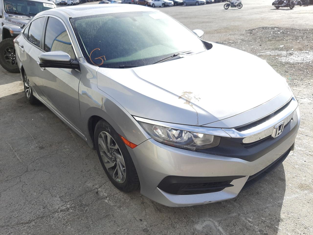 HONDA CIVIC EX 2017 z numerem VIN 19XFC2F72HE019783 - Zdjęcie z aukcji