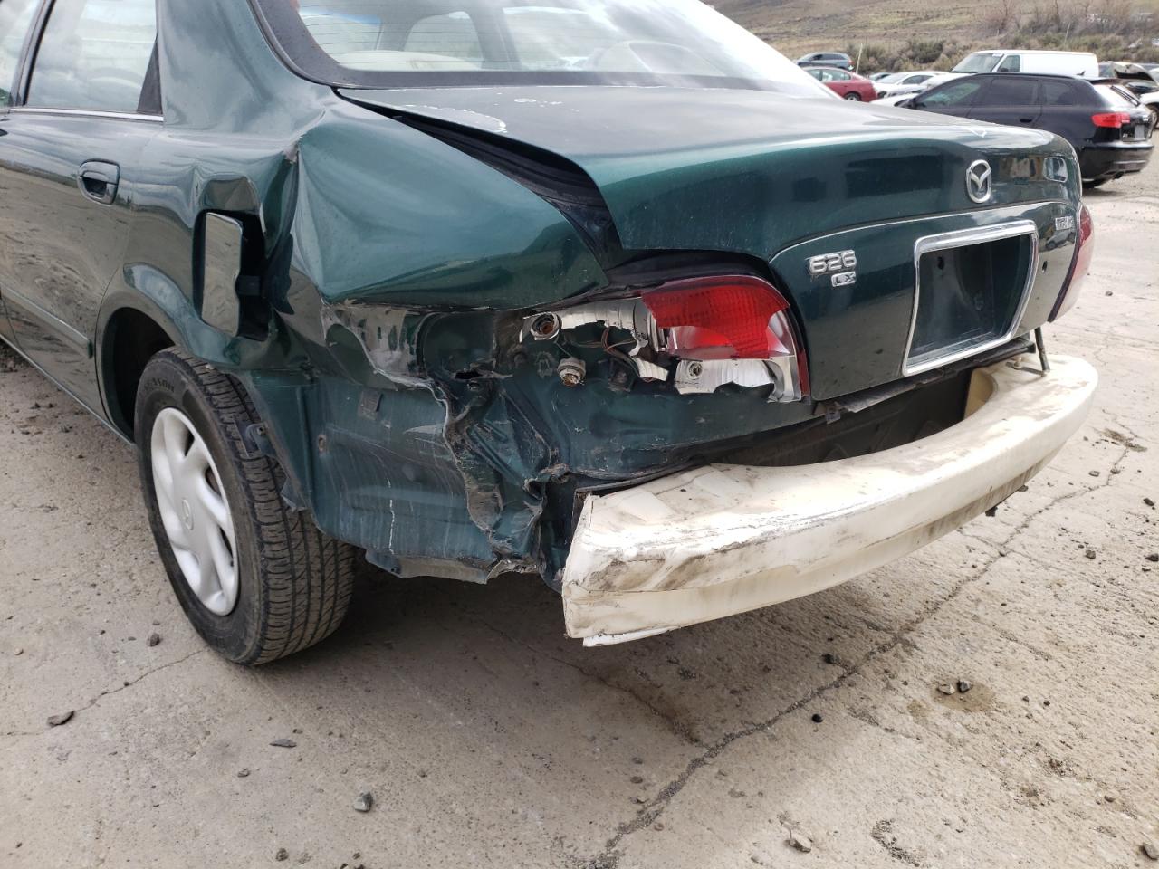 Photo 9 from auction – 1999 MAZDA 626 ES with VIN 1YVGF22C5X5851413