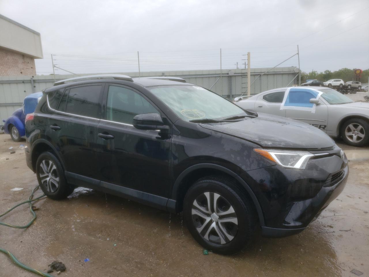 TOYOTA RAV4 LE 2016 with VIN 2T3ZFREV9GW310300 - Photo from auction