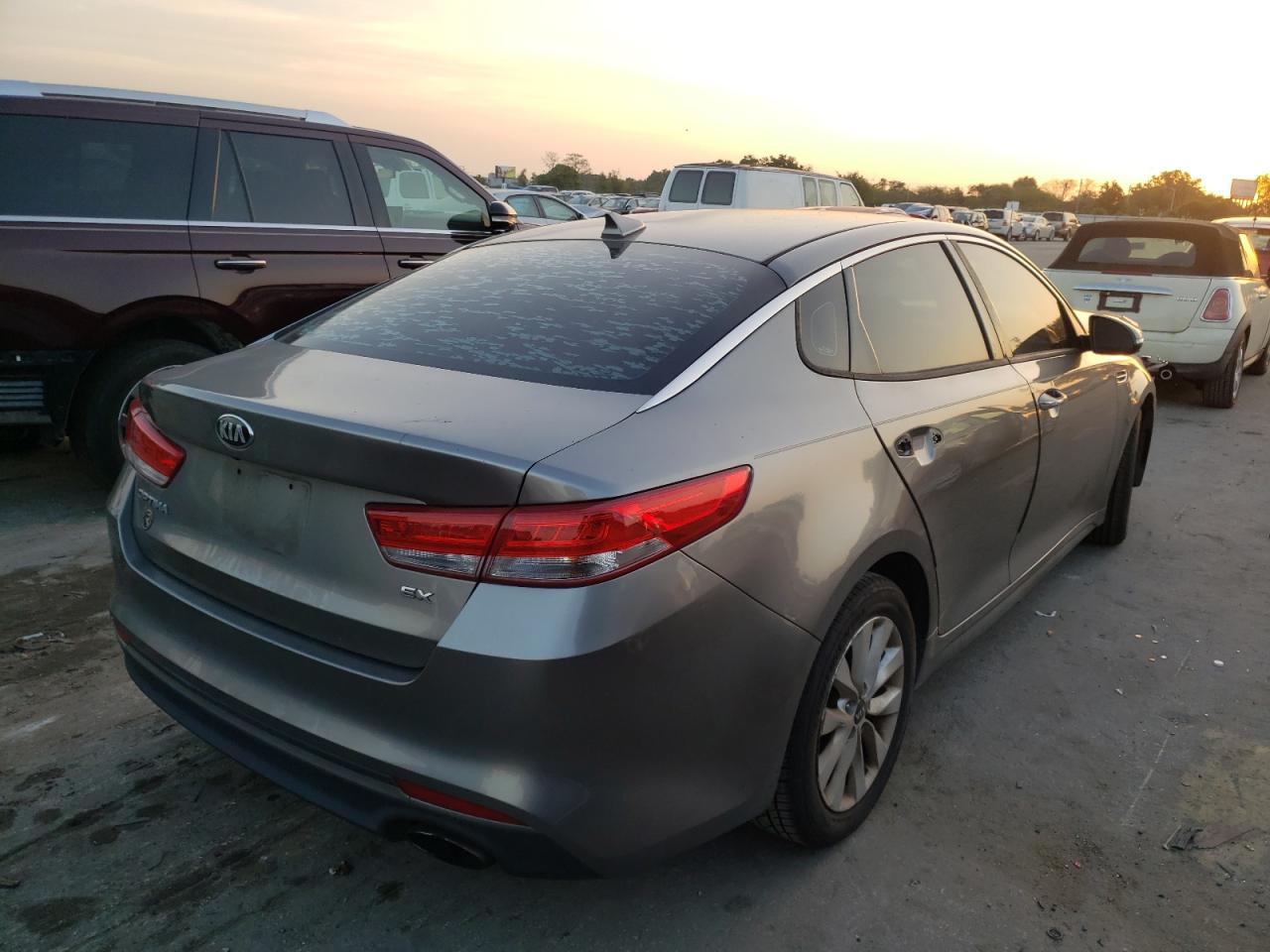 Photo 4 from auction – 2016 KIA OPTIMA EX with VIN 5XXGU4L35GG035593
