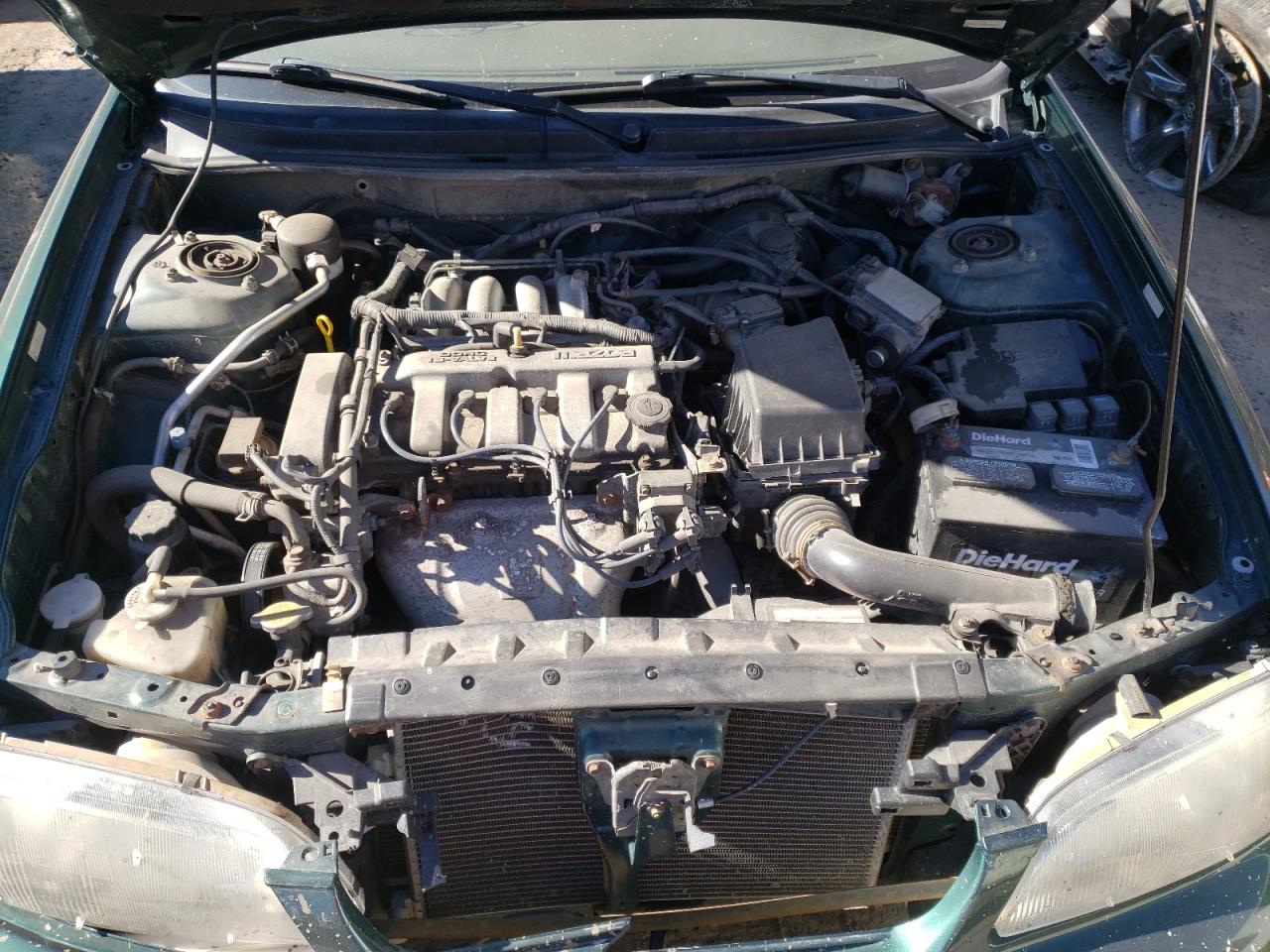 Photo 7 from auction – 1999 MAZDA 626 ES with VIN 1YVGF22C2X5857427