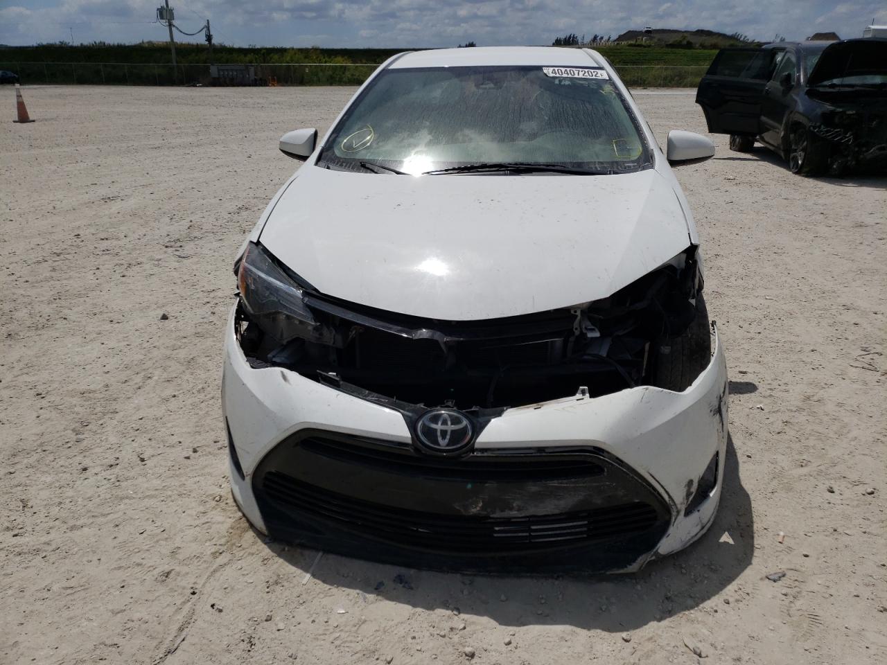 Photo 9 from auction – 2017 TOYOTA COROLLA L with VIN 5YFBURHE4HP678270