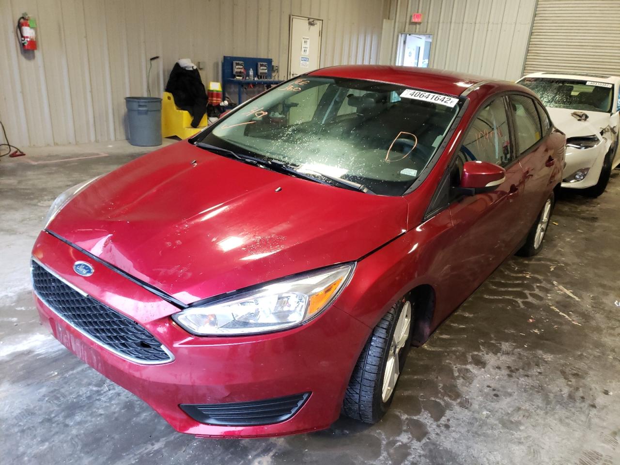Photo 2 from auction – 2016 FORD FOCUS SE with VIN 1FADP3F24GL405056