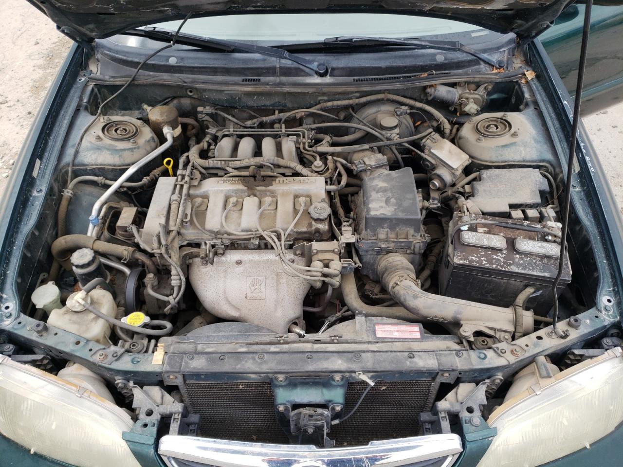 Photo 7 from auction – 1999 MAZDA 626 ES with VIN 1YVGF22C5X5851413