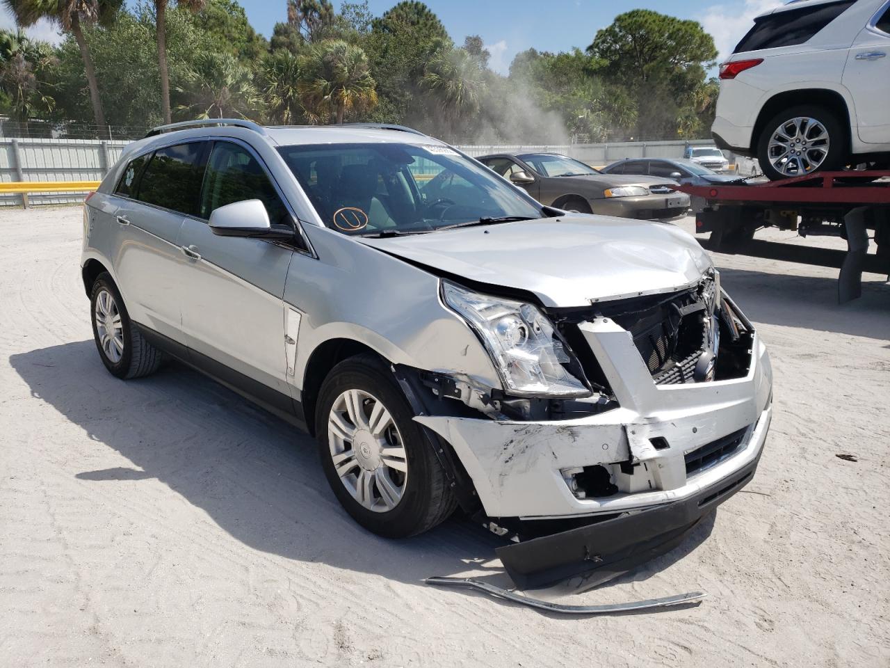 CADILLAC SRX LUXURY 2012 with VIN 3GYFNAE34CS657914 - Photo from auction