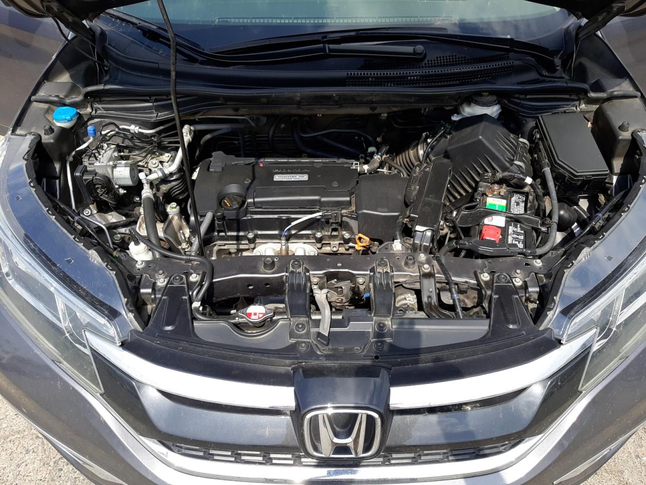 Photo 7 from auction – 2016 HONDA CR-V EX with VIN 3CZRM3H52GG720977