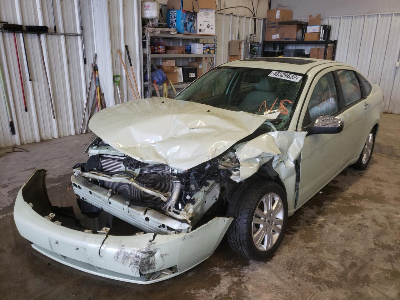Photo 2 from auction – 2011 FORD FOCUS SEL with VIN 1FAHP3HN3BW205057