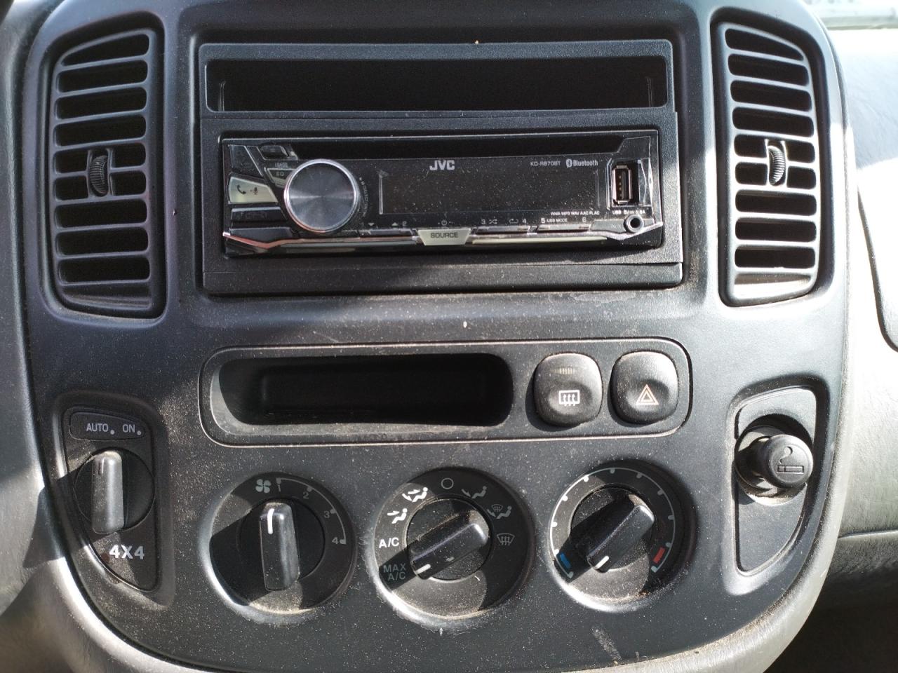 Photo 9 from auction – 2003 FORD ESCAPE XLS with VIN 1FMYU92173KC66623