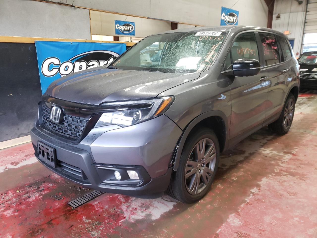 Photo 2 from auction – 2019 HONDA PASSPORT E with VIN 5FNYF8H56KB025733