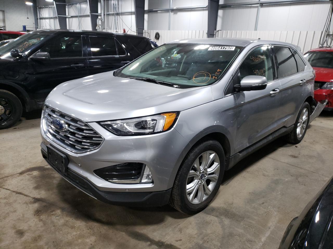 Photo 2 from auction – 2021 FORD EDGE TITAN with VIN 2FMPK4K97MBA13422