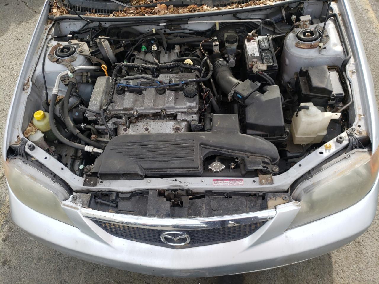 Photo 7 from auction – 2002 MAZDA PROTEGE DX with VIN JM1BJ226820635649
