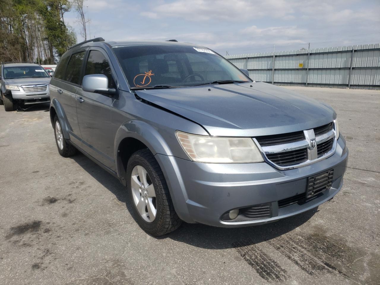 DODGE JOURNEY SX 2010 with VIN 3D4PG5FV8AT145059 - Photo from auction