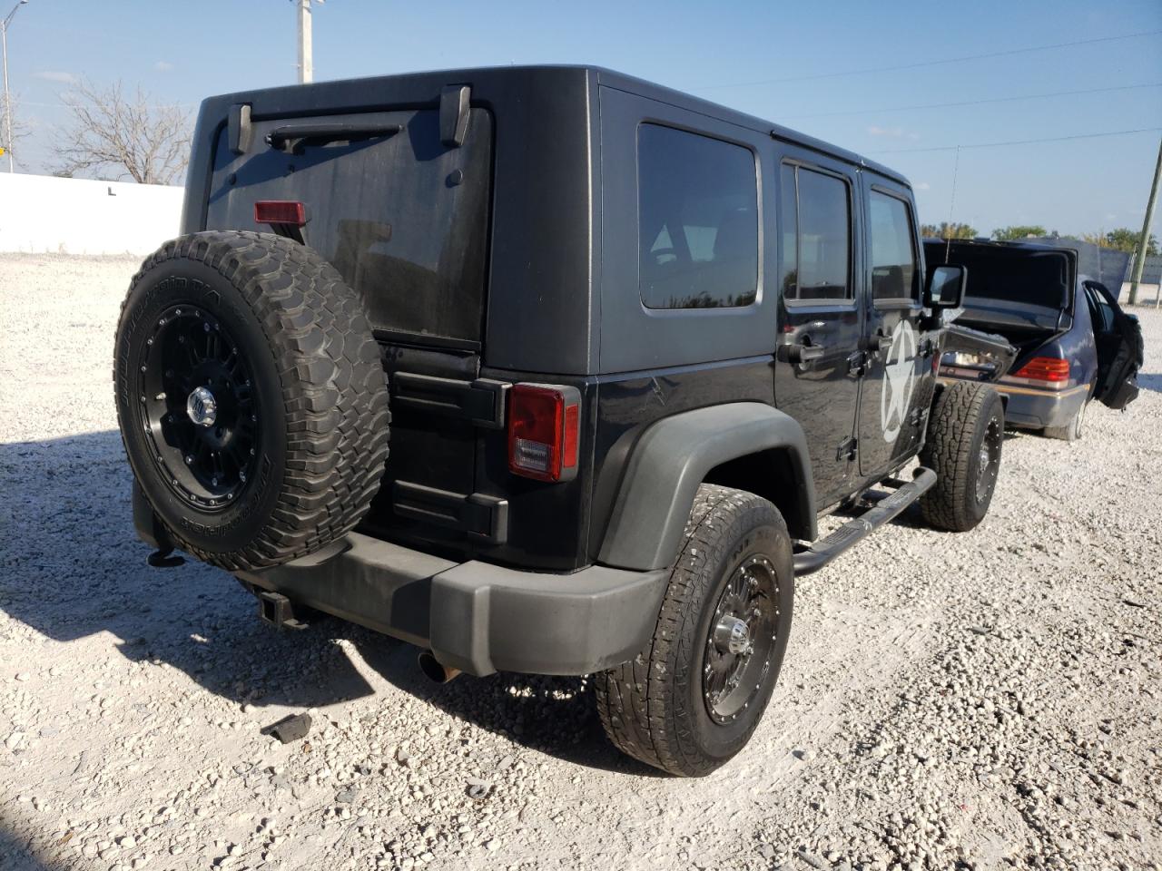 Photo 4 from auction – 2009 JEEP WRANGLER U with VIN 1J8GA69109L767930