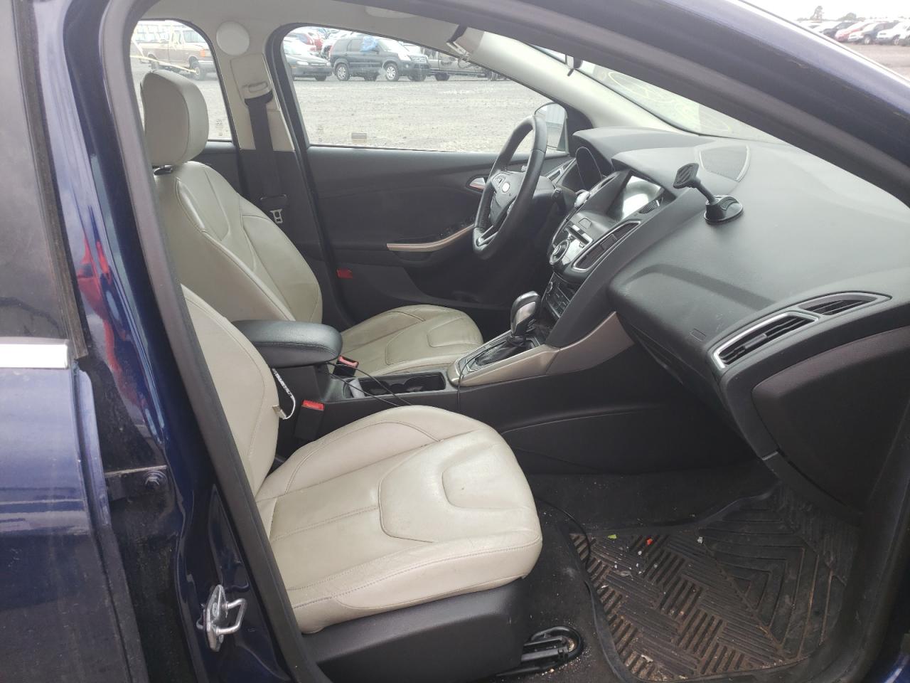 Photo 5 from auction – 2016 FORD FOCUS TITA with VIN 1FADP3N24GL340453