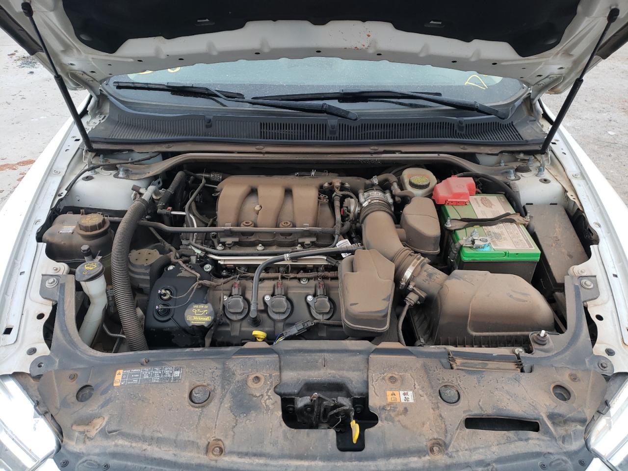 Photo 7 from auction – 2013 FORD TAURUS SEL with VIN 1FAHP2E81DG169262
