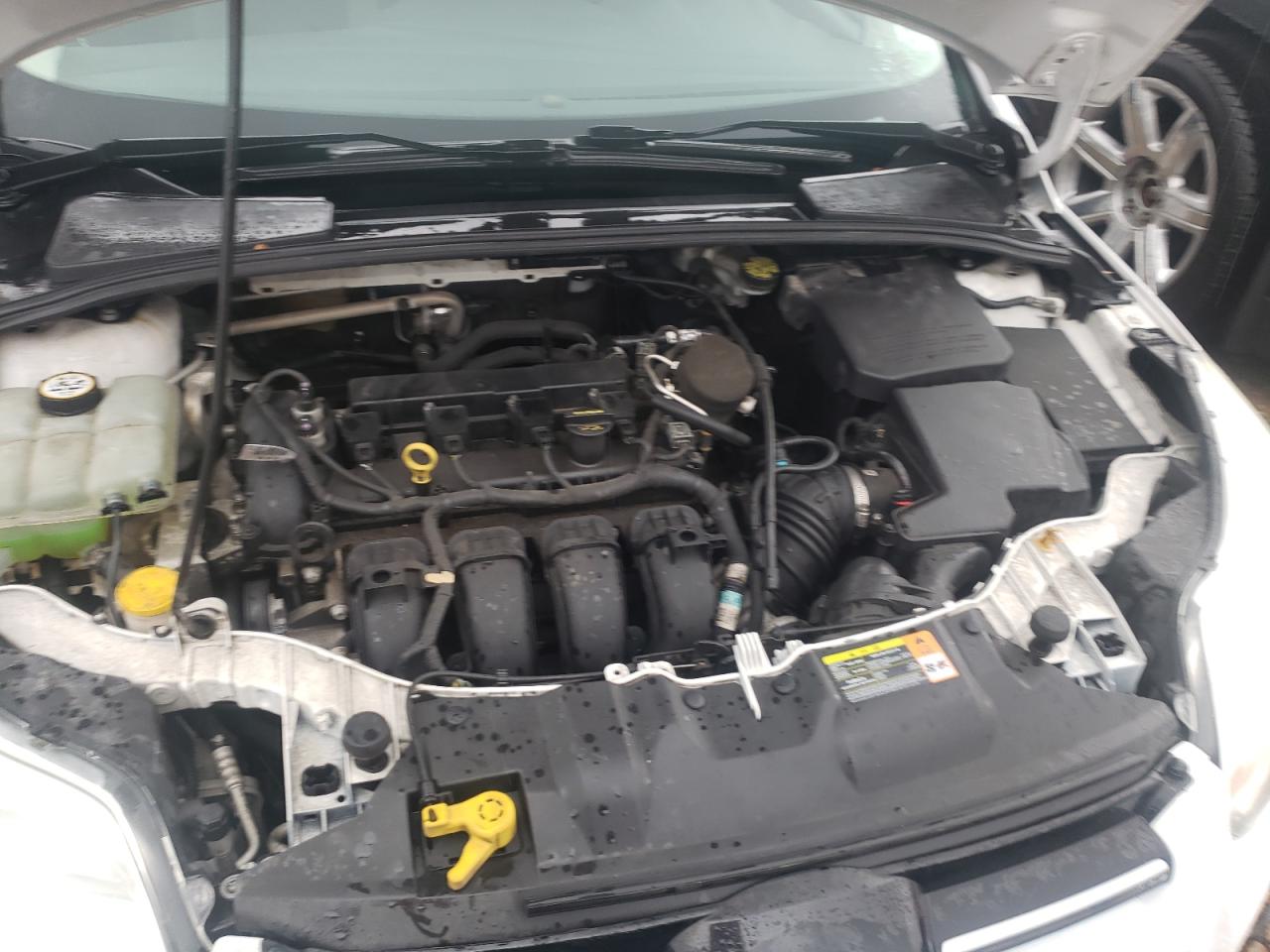 Photo 7 from auction – 2012 FORD FOCUS SE with VIN 1FAHP3K25CL444546
