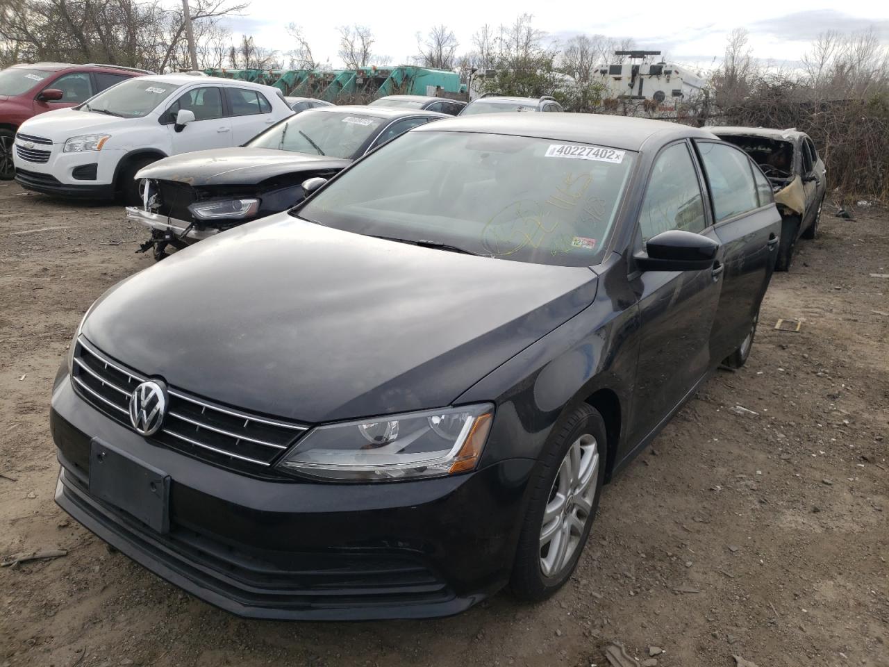 Photo 2 from auction – 2018 VOLKSWAGEN JETTA S with VIN 3VW2B7AJ3JM257328
