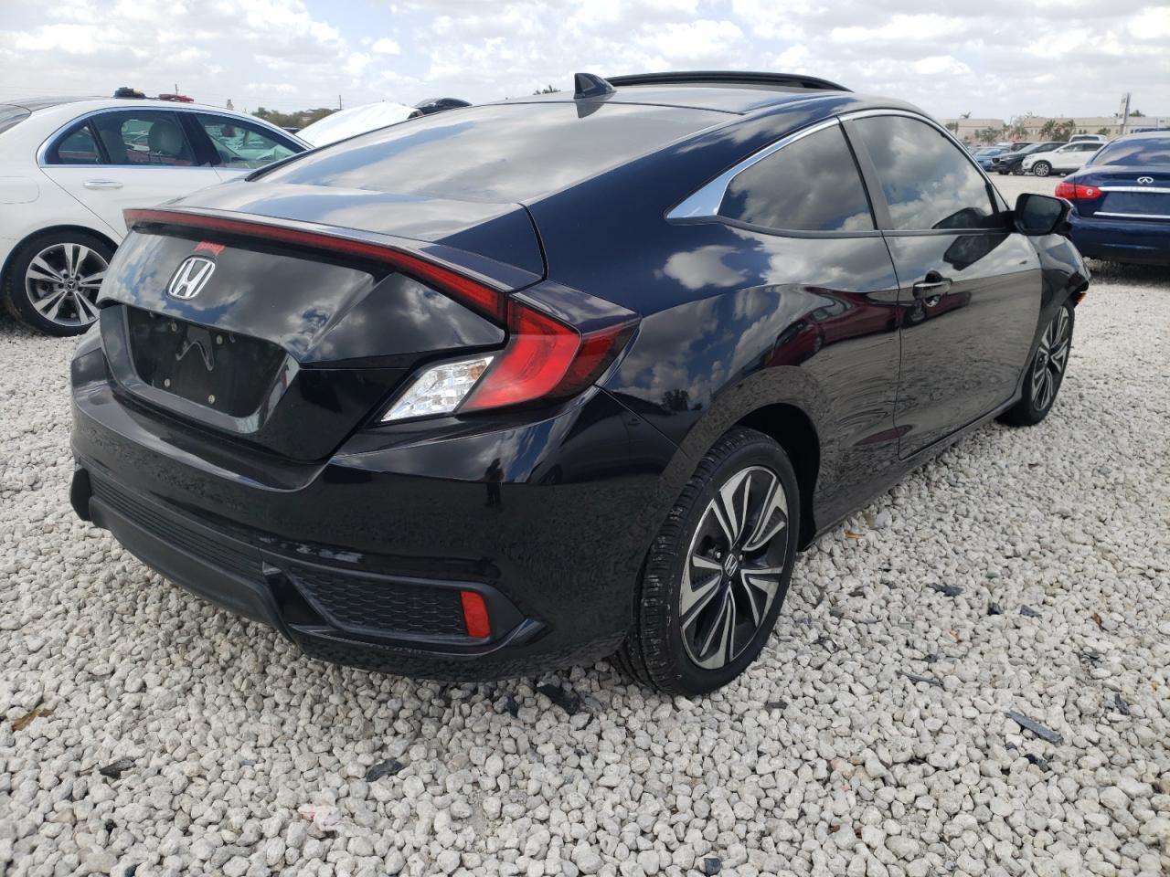 Photo 4 from auction – 2016 HONDA CIVIC EX with VIN 2HGFC3B32GH358749