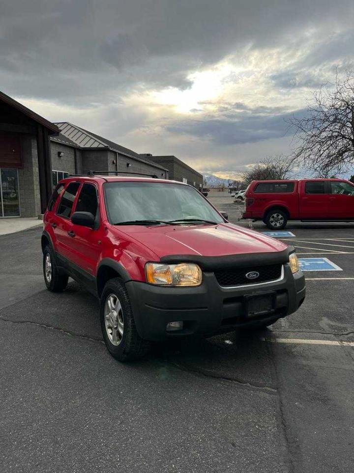 FORD ESCAPE XLT 2002 with VIN 1FMYU04112KA90207 - Photo from auction