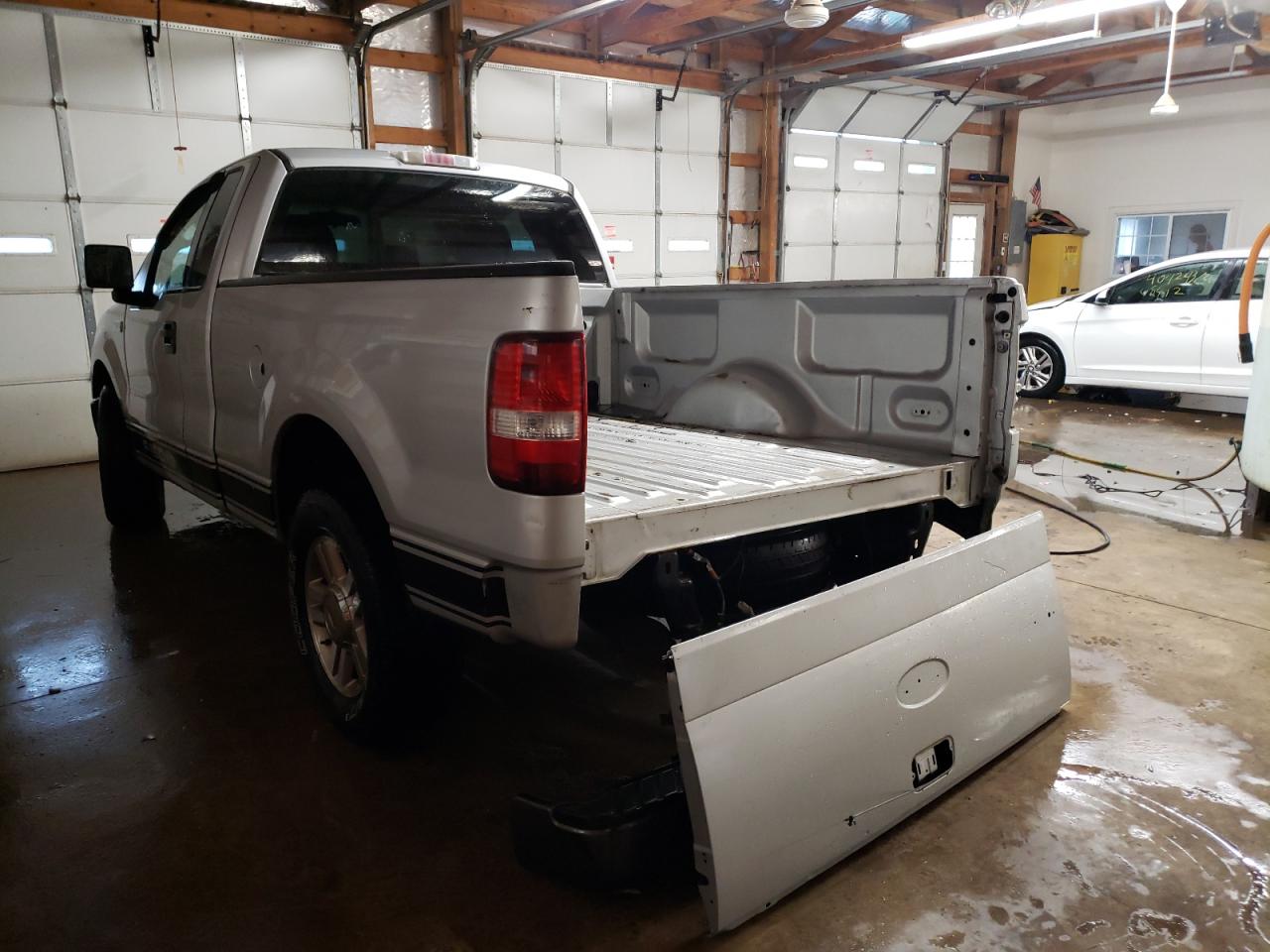 Photo 3 from auction – 2006 FORD F150 with VIN 1FTRF12206NA19167