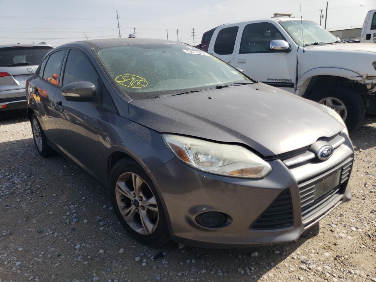 FORD FOCUS SE 2014 with VIN 1FADP3F22EL389842 - Photo from auction