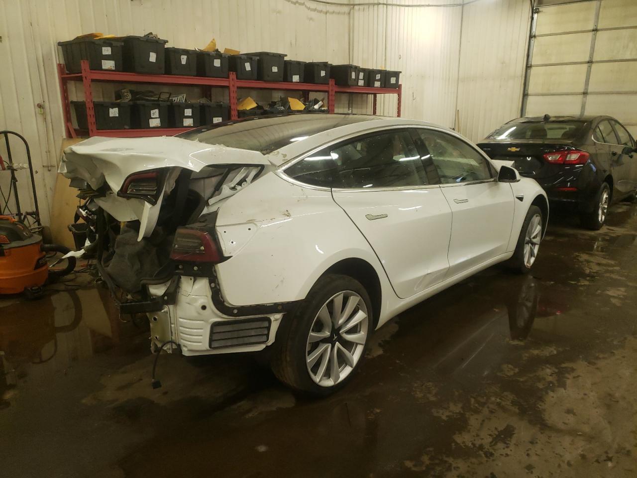 Photo 4 from auction – 2018 TESLA MODEL 3 with VIN 5YJ3E1EB8JF117794