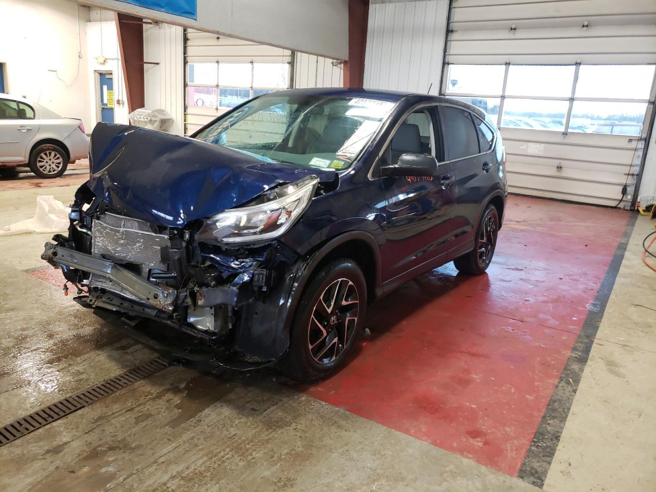 Photo 2 from auction – 2016 HONDA CR-V SE with VIN 5J6RM4H4XGL064883