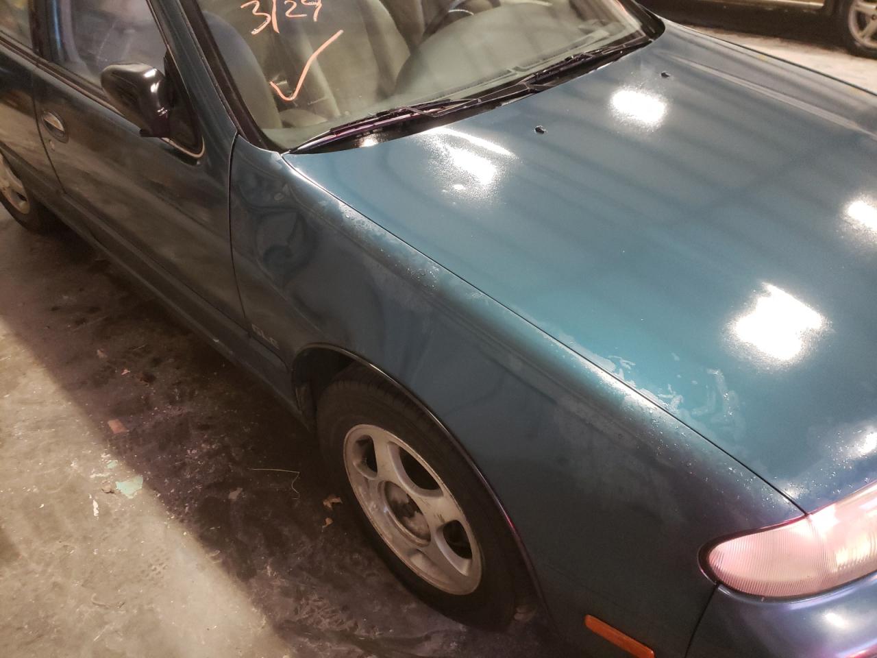 Photo 9 from auction – 1994 NISSAN ALTIMA XE with VIN 1N4BU31D5RC103996