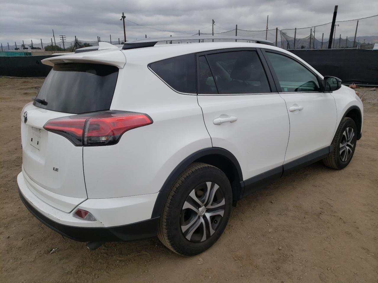 Photo 4 from auction – 2018 TOYOTA RAV4 LE with VIN 2T3ZFREV9JW460074
