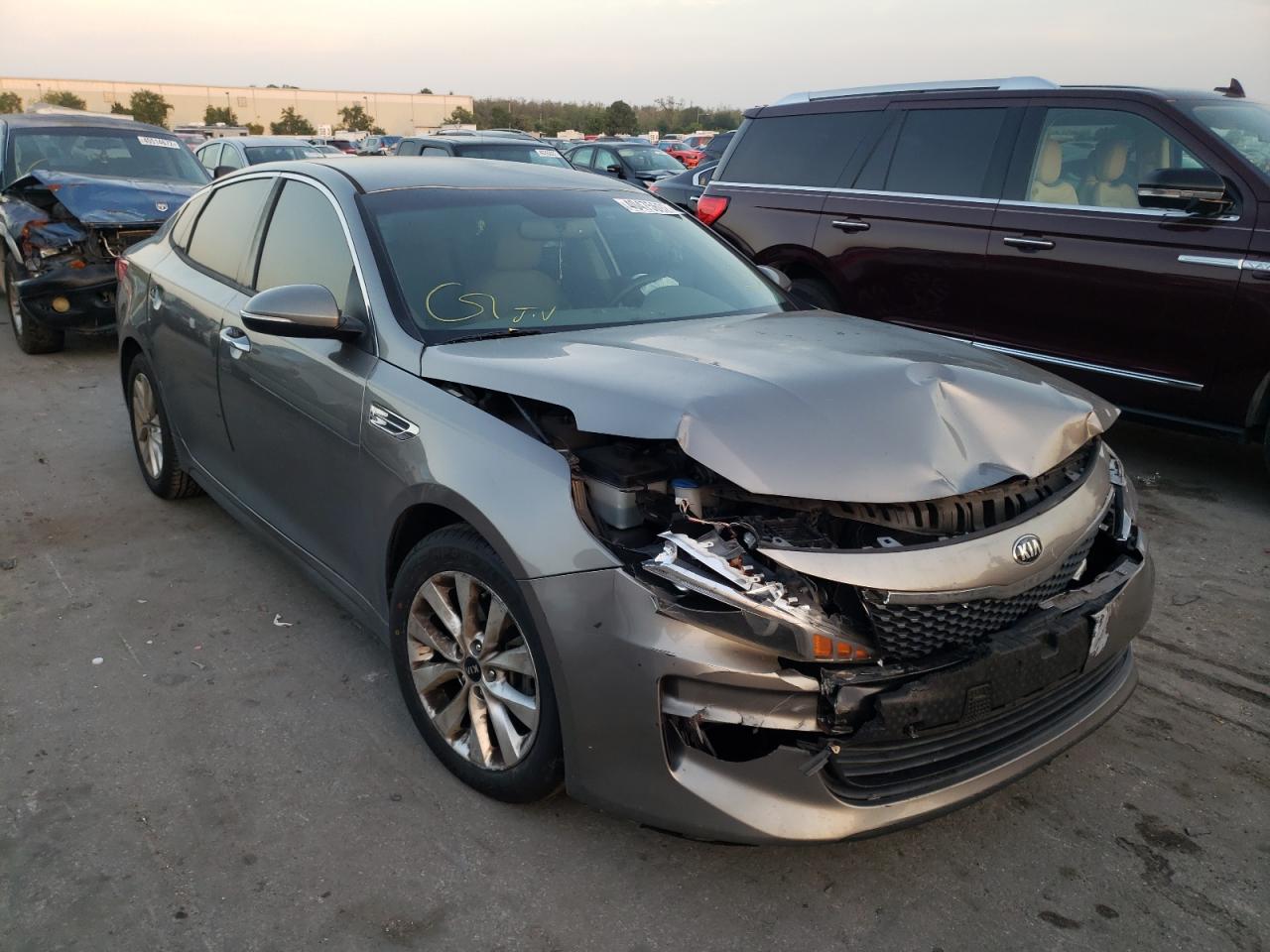 KIA OPTIMA EX 2016 with VIN 5XXGU4L35GG035593 - Photo from auction