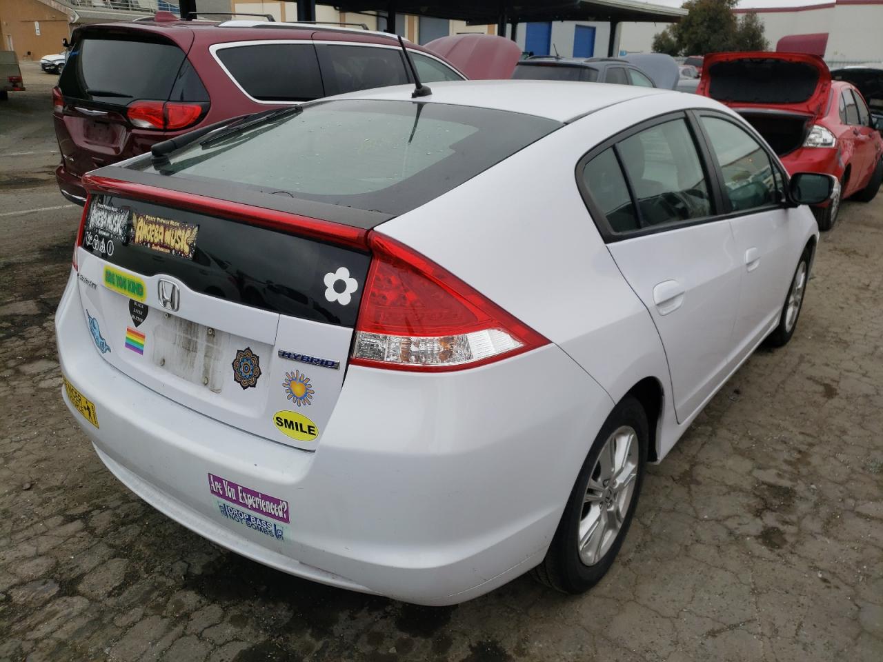 Photo 4 from auction – 2010 HONDA INSIGHT EX with VIN JHMZE2H7XAS043013