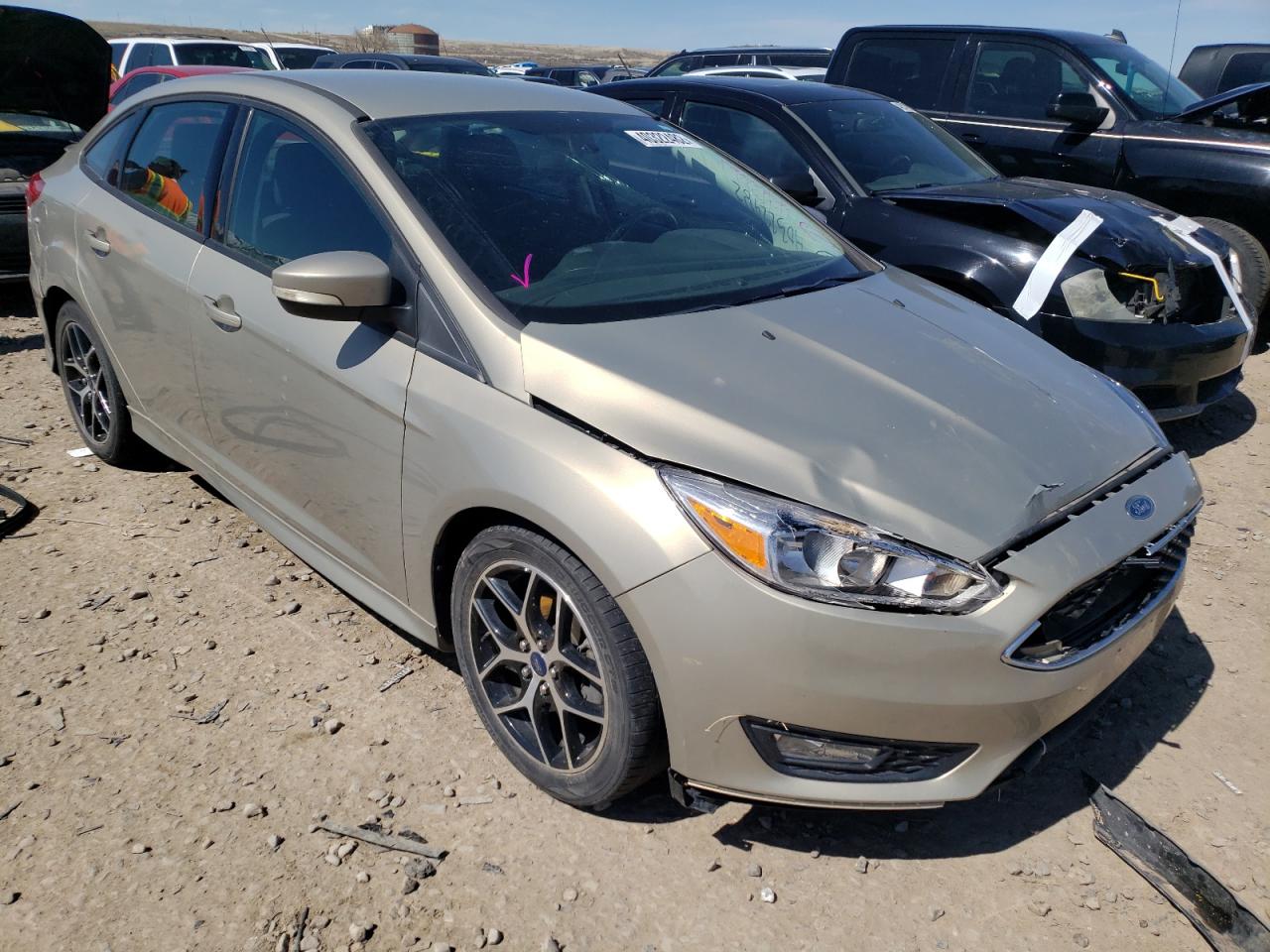 FORD FOCUS SE 2015 with VIN 1FADP3F29FL380363 - Photo from auction