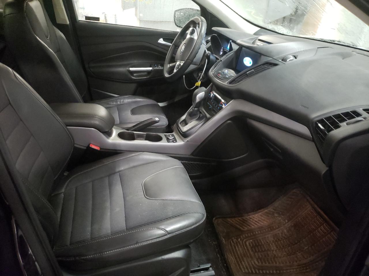 Photo 5 from auction – 2016 FORD ESCAPE SE with VIN 1FMCU9GX6GUB38357