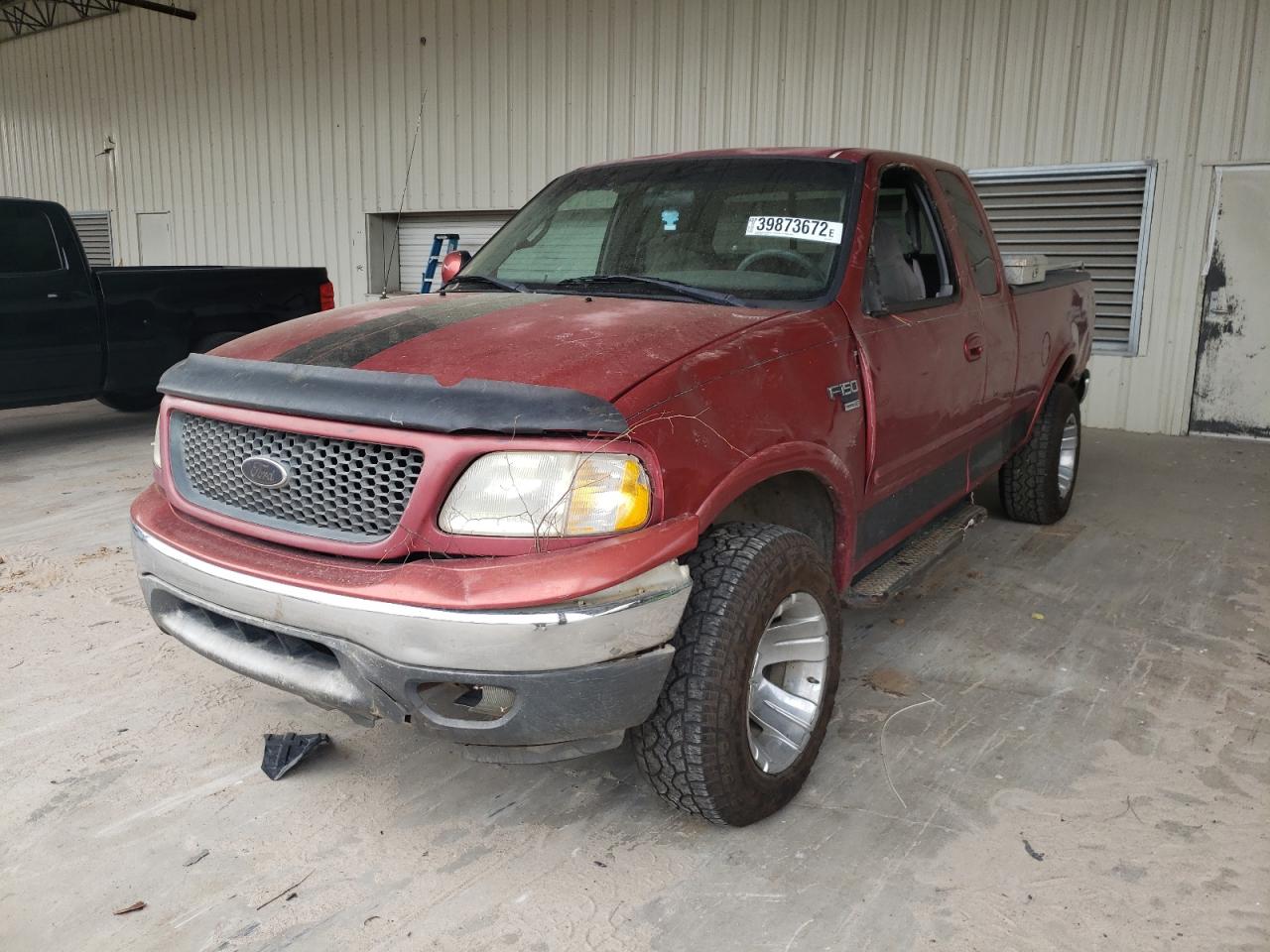 Photo 2 from auction – 2000 FORD F150 with VIN 1FTRX18W6YNA21144