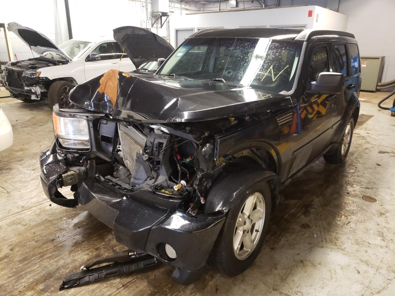 Photo 2 from auction – 2009 DODGE NITRO SLT with VIN 1D8GU58K89W535756