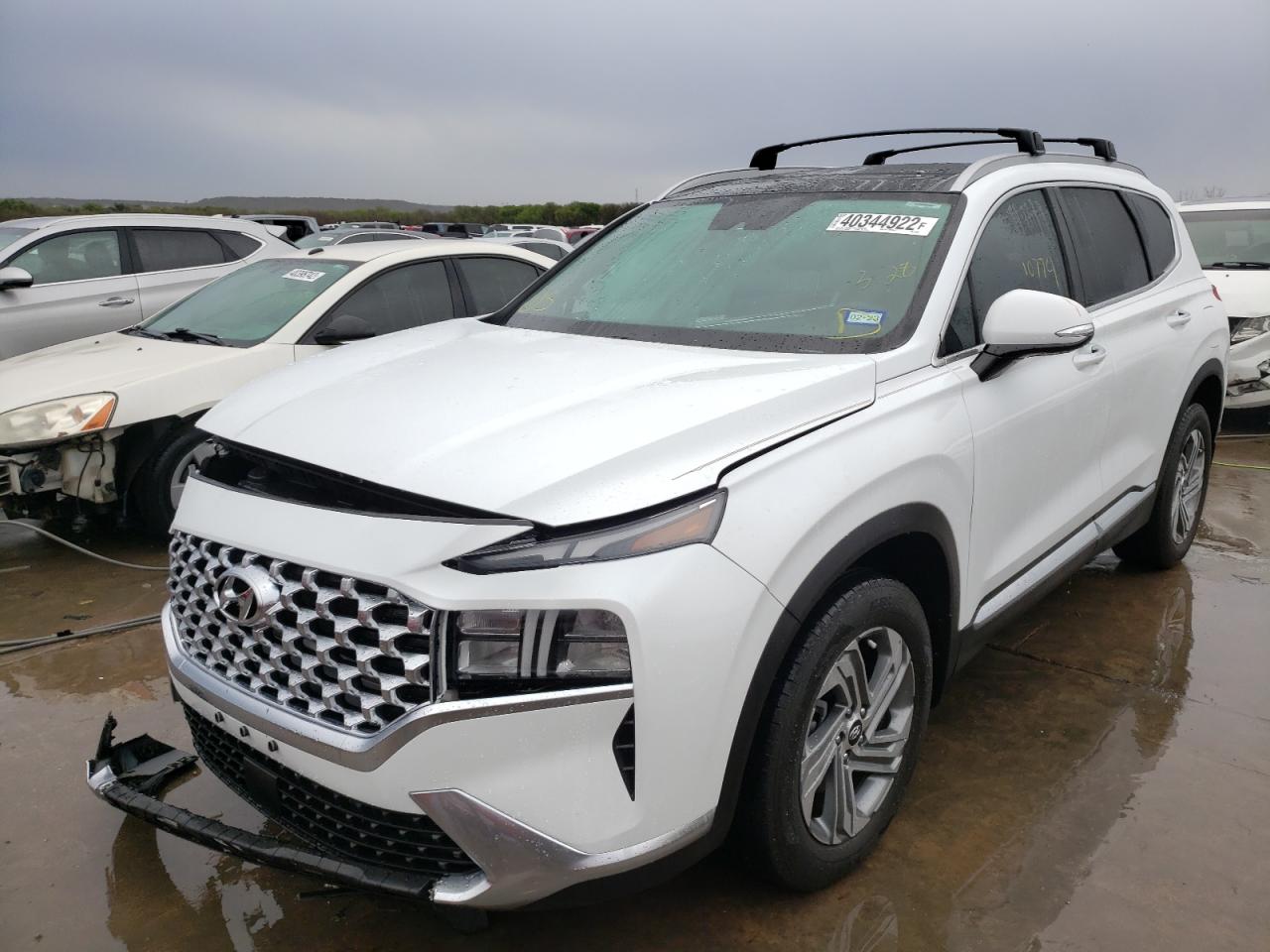 Photo 2 from auction – 2021 HYUNDAI SANTA FE S with VIN 5NMS34AJ4MH363003