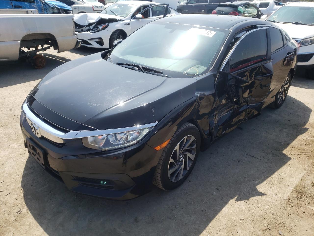 Photo 2 from auction – 2018 HONDA CIVIC EX with VIN 19XFC2F78JE204748