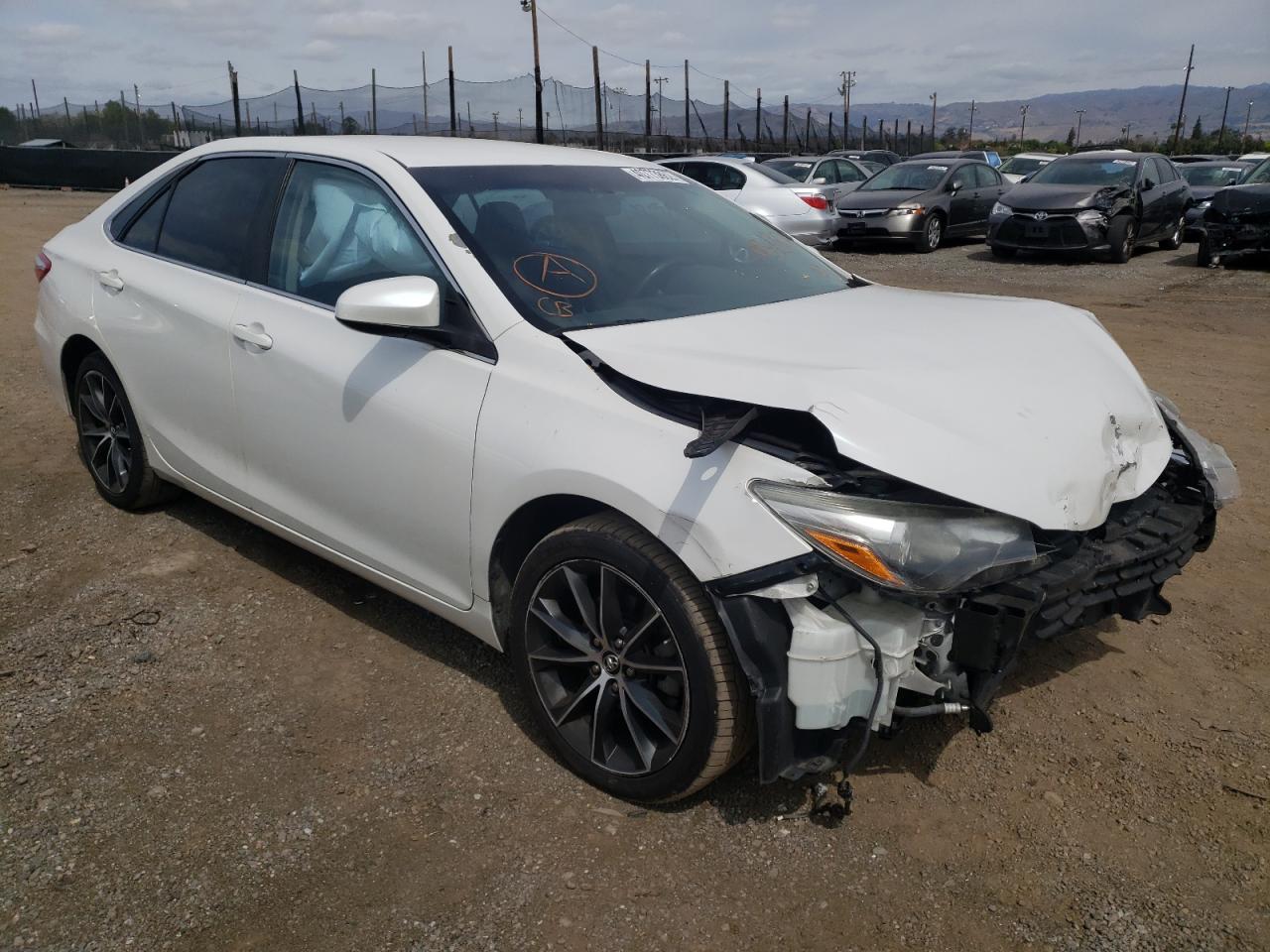 TOYOTA CAMRY LE 2015 with VIN 4T1BF1FK9FU024719 - Photo from auction