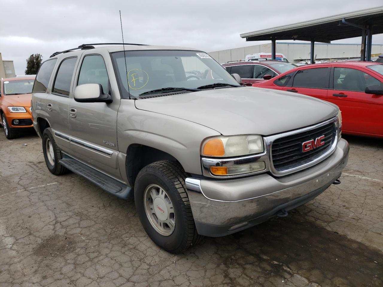 GMC YUKON 2001 with VIN 1GKEC13V21J302447 - Photo from auction