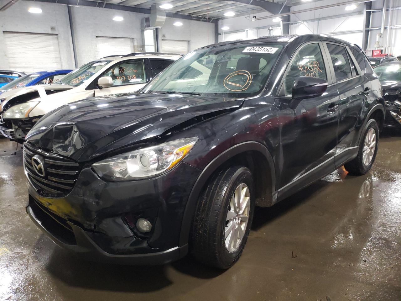Photo 2 from auction – 2016 MAZDA CX-5 TOURI with VIN JM3KE4CY8G0615397