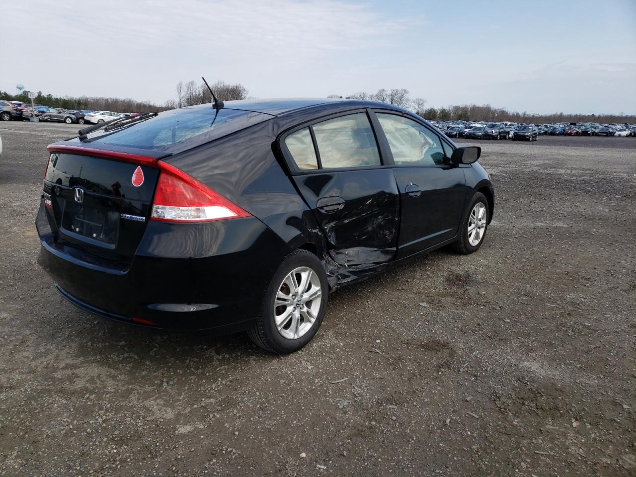 Photo 9 from auction – 2010 HONDA INSIGHT EX with VIN JHMZE2H76AS002071