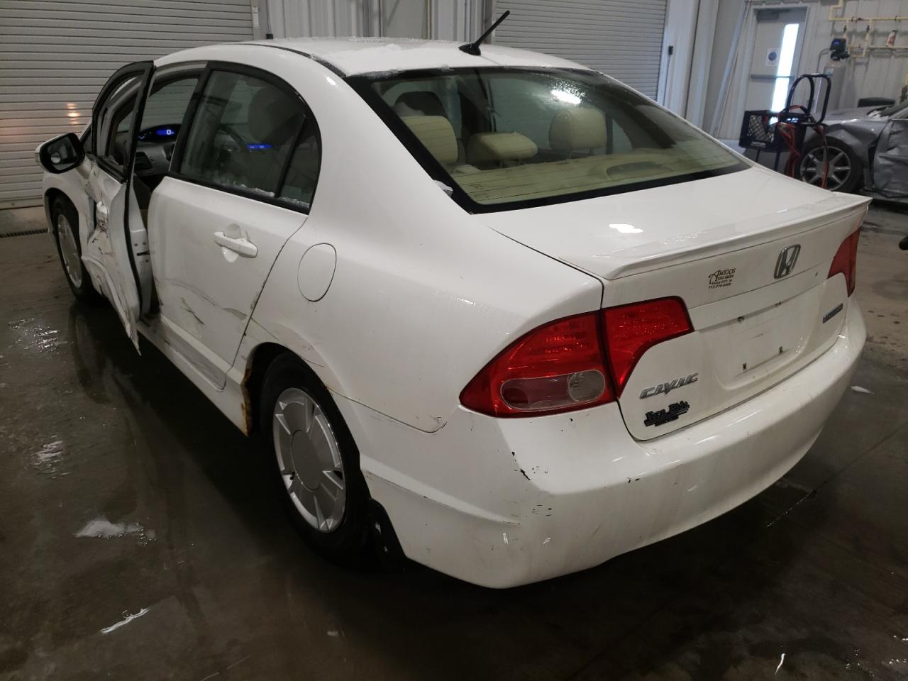Photo 3 from auction – 2006 HONDA CIVIC HYBR with VIN JHMFA36296S018333