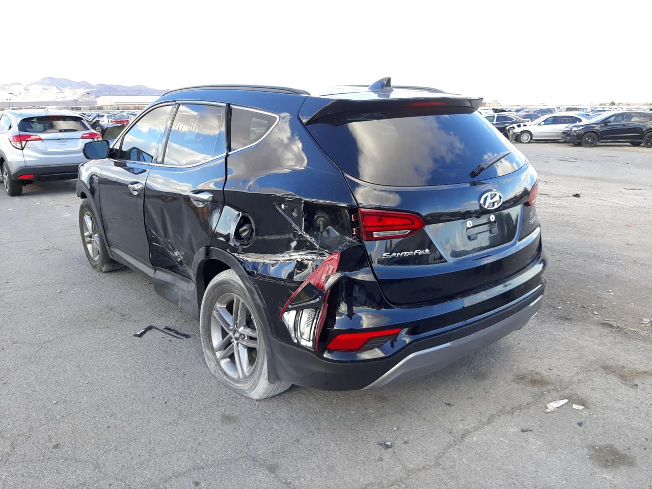 Photo 3 from auction – 2017 HYUNDAI SANTA FE S with VIN 5NMZU3LB3HH026145