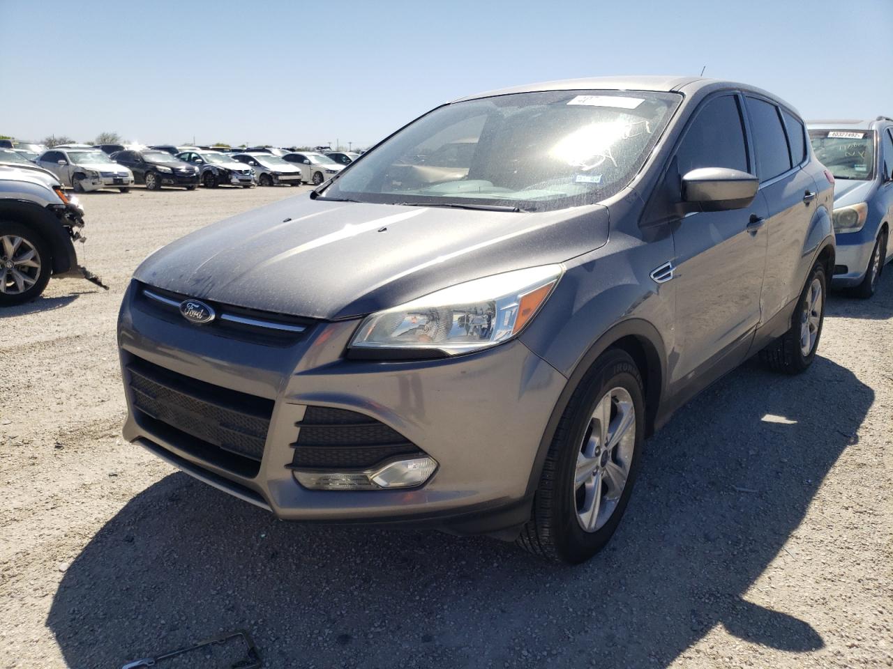 Photo 2 from auction – 2014 FORD ESCAPE SE with VIN 1FMCU0GXXEUD88614