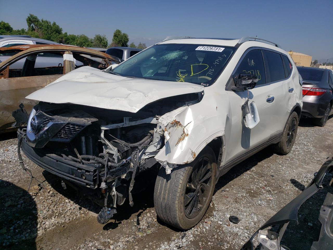 Photo 2 from auction – 2015 NISSAN ROGUE S with VIN 5N1AT2MT2FC858892