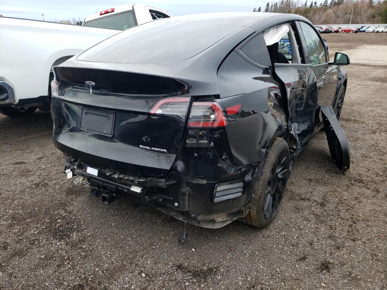 Photo 9 from auction – 2021 TESLA MODEL Y with VIN 5YJYGDEE3MF181970