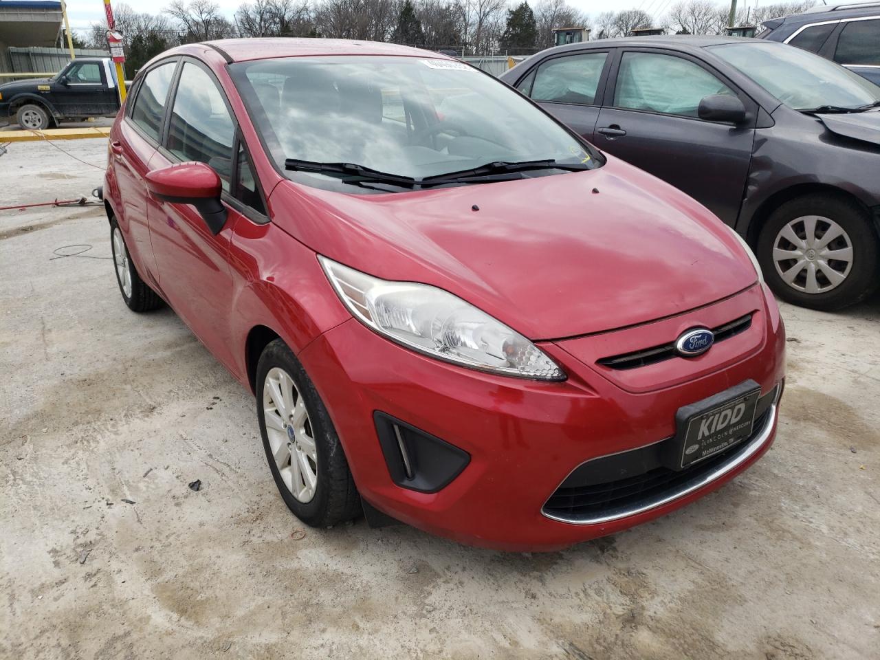 FORD FIESTA SE 2011 with VIN 3FADP4EJ8BM232048 - Photo from auction