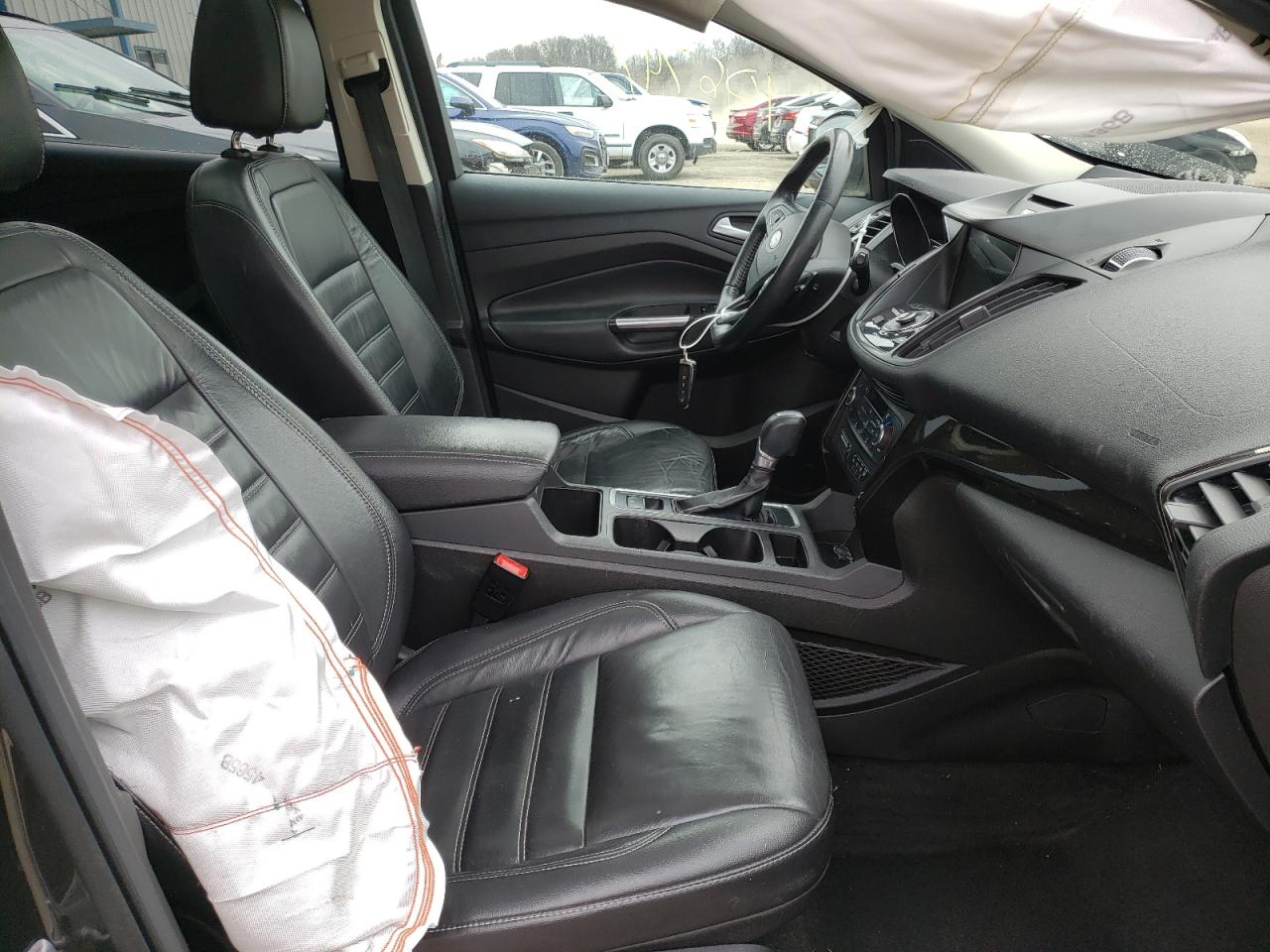 Photo 5 from auction – 2017 FORD ESCAPE TIT with VIN 1FMCU9J98HUD90686