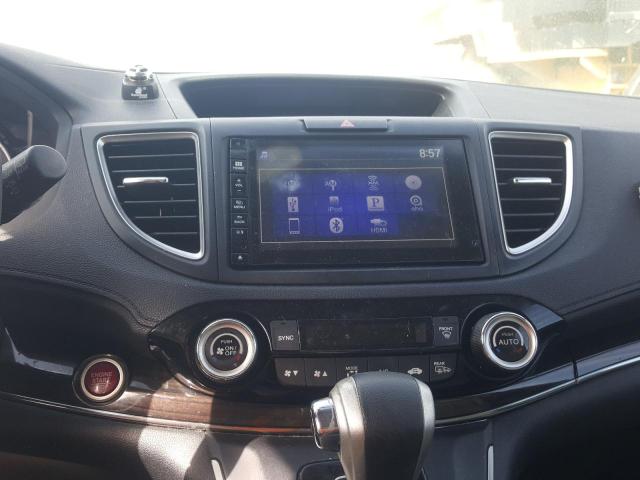 Photo 9 from auction – 2016 HONDA CR-V EXL with VIN 2HKRM3H71GH556068