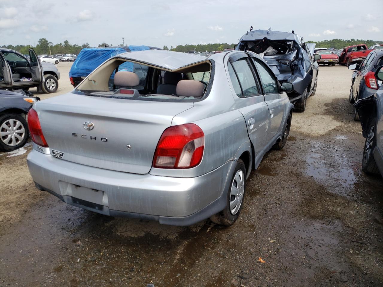 Photo 4 from auction – 2000 TOYOTA ECHO with VIN JTDBT1236Y0007883